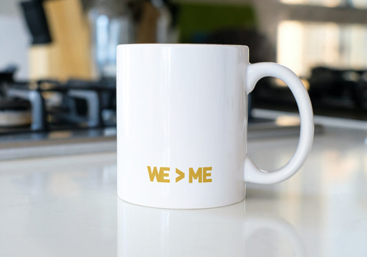 WE > ME Mugs